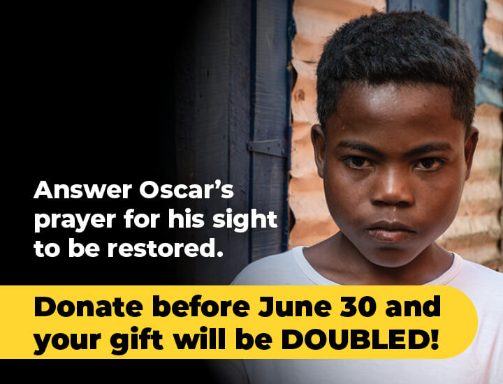 An image of Oscar with the caption 'Answer Oscar's prayer for his sight to be restored. Donate before June 30 and your gift will be DOUBLED!'
