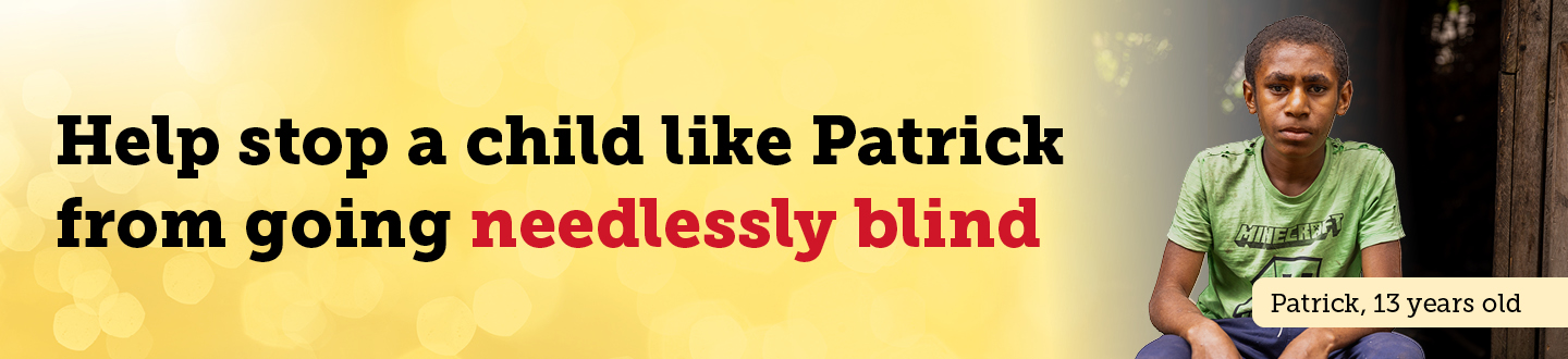 A boy looking towards the camera with text overlay that reads 'Help stop a child like Patrick from going needlessly blind'
