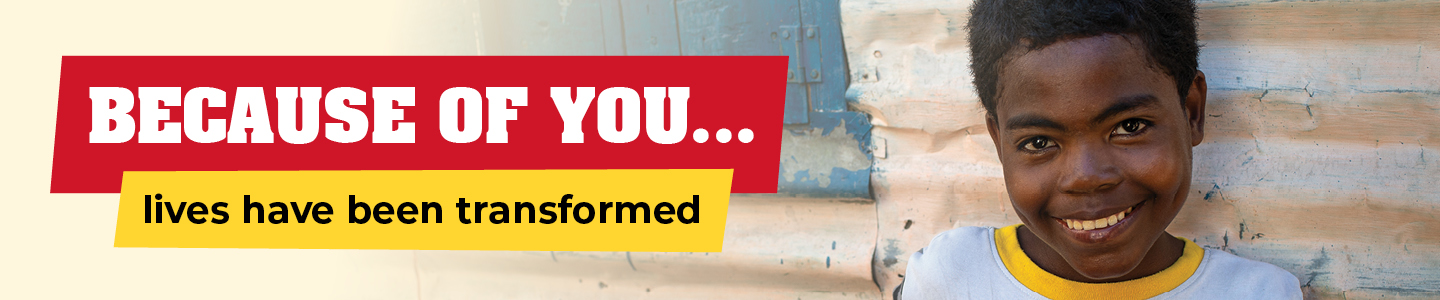 A young boy with overlay text that reads 'BECAUSE OF YOU... lives have been transformed'