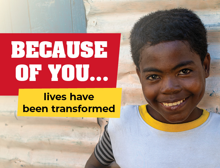 A young boy with overlay text that reads 'BECAUSE OF YOU... lives have been transformed'
