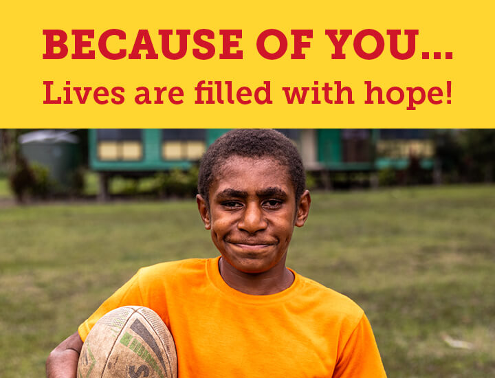 A young boy smiling with text overlay of 'because of you our lives our filled with hope'