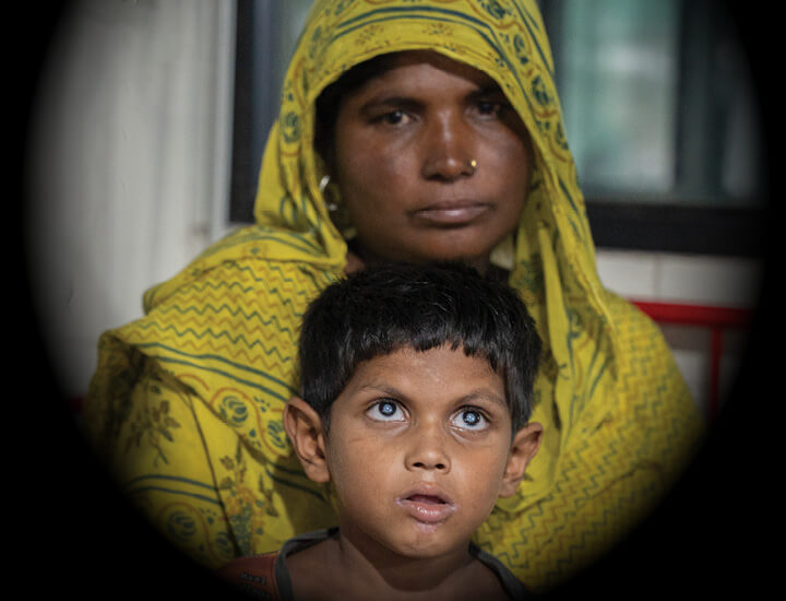 An image of a young boy and his mother'